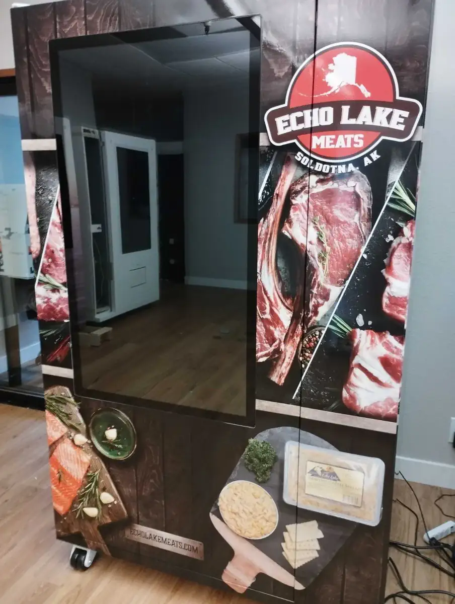 DMVI touchscreen vending unit in a modern retail environment