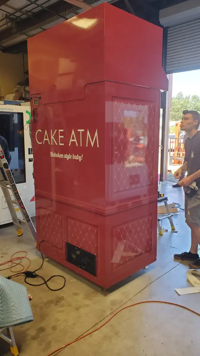 DMVI smart vending machine in a shopper-facing concourse installation