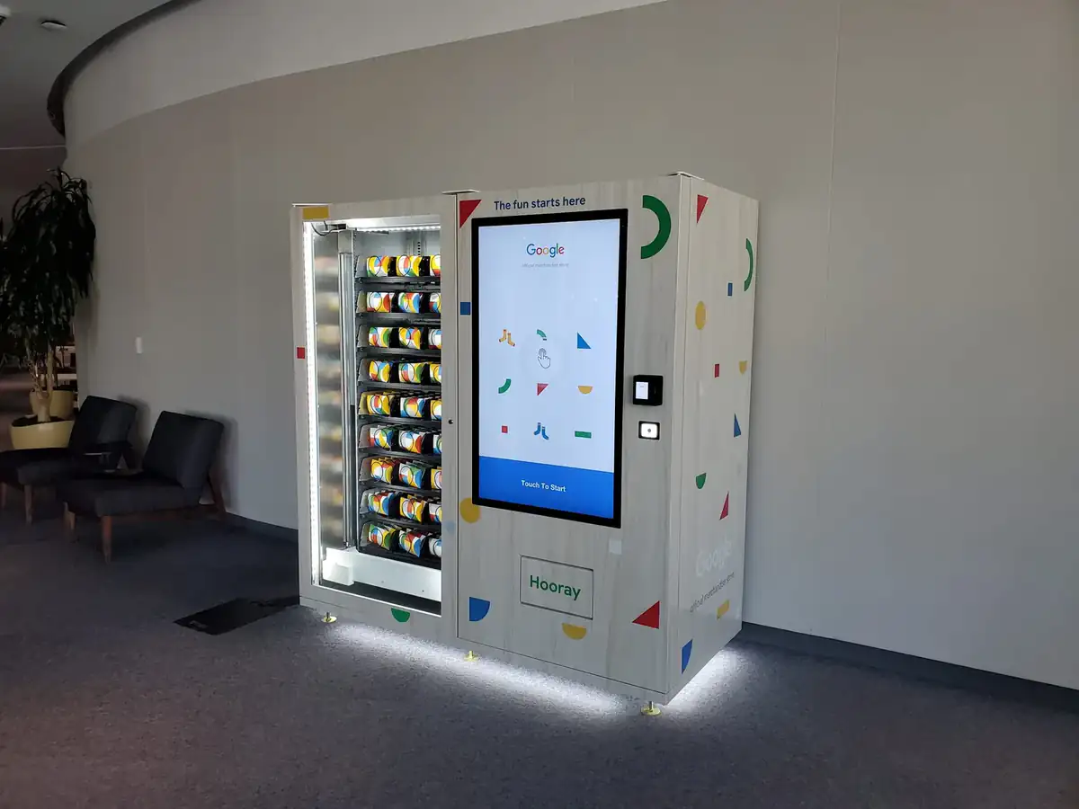 DMVI floor-standing smart vending machine with illuminated product display