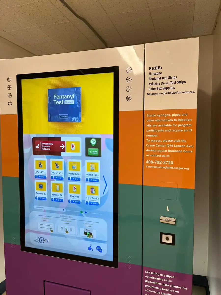 DMVI floor-standing smart vending machine with illuminated product display