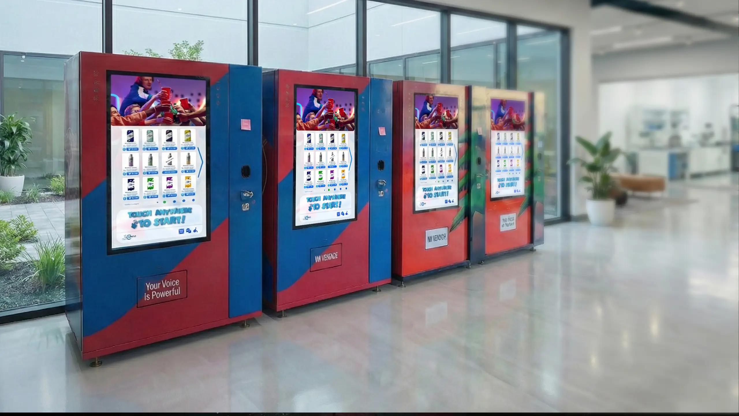 Row of modern smart vending machines with large touchscreens in a bright office or lobby setting